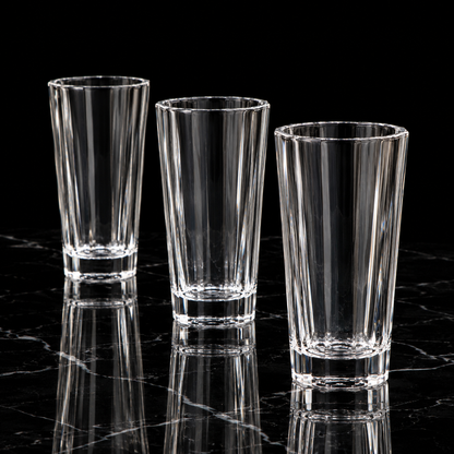 Faceted crystal tumbler on black marble