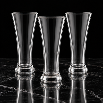 Tall beverage glasses on black marble