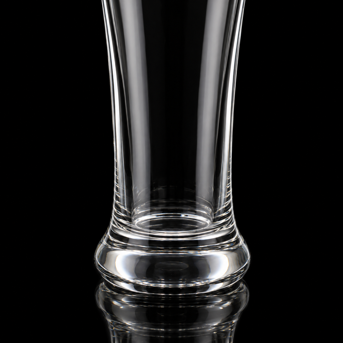 Tall beverage glass base close-up
